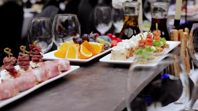 Refined appetizers carefully positioned on pristine white tablecloth, showcasing culinary artistry for upscale dining experience
