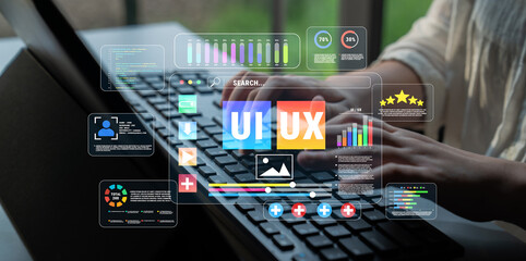 Naklejka premium Hands Typing on Keyboard with User Interface Elements and Data Visualization for UI UX Design Concept in Modern Workspace Quark.