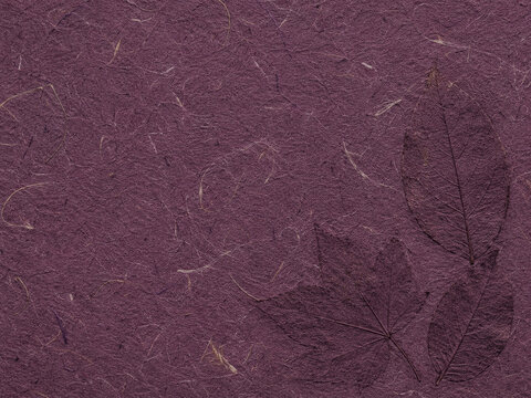 Dark purple Japanese washi paper texture background with subtle leaf pattern
