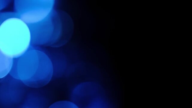 bstract Blue Bokeh Lights Defocused Soft Background Loop