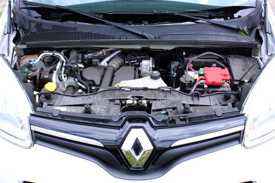
Vinnytsia, Ukraine; May 30, 2026. White Renault Kangoo open hood. Close up Renault Kangoo cdi diesel engine. Modern сar close-up engine, front top view, show all engine parts. Detailed view of an ope