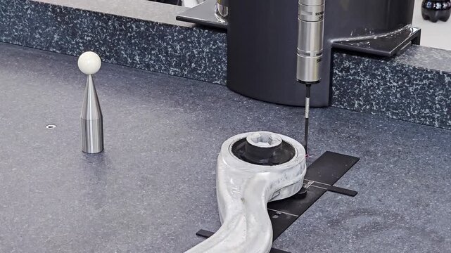Coordinate Measuring Machine CMM Probe Inspecting Automotive Part in Quality Control Lab