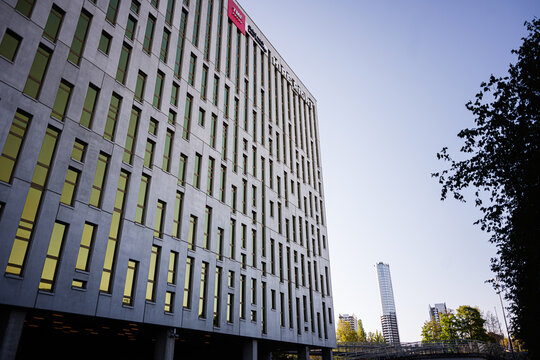 Modern HireRight and TMF Group office building with repetitive windows and concrete facade in Katowice Poland city center urban architecture scene