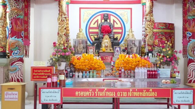 Buriram City Pillar Shrine interior, Chao Pho Lak Mueang Chinese-Thai deity altar worship, 6 June 2026 , Thailand
