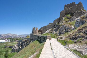 Fototapeta premium Van Kalesi, the archeological castle and citadel ruins that overlook Van City and Lake Van in Eastern Turkey.