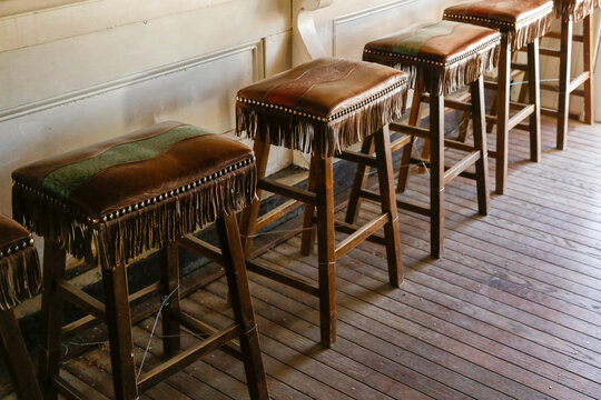 Western bar stools with leather fringe