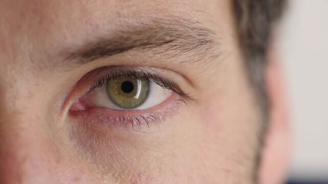 Eye, opening and sight with man closeup for optometry appointment or vision correction. Exam, eyecare and test with patient at ophthalmology checkup for visual development, enhancement or improvement