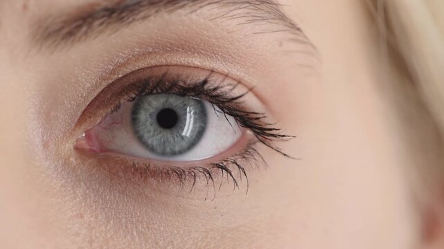 Face, woman and eye with closeup for optometry, perception and awareness for eyesight. Portrait, female person and retina with peripheral vision, iris examination and optical care for visual health
