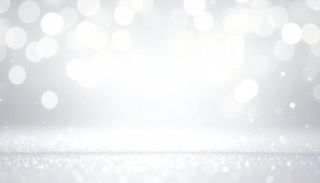 Ethereal silver glitter foreground with brilliant white bokeh backdrop