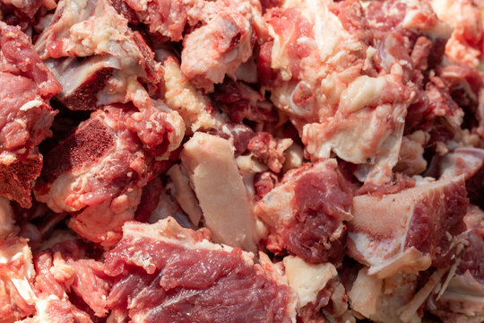 Fresh raw meat with bones cut into pieces