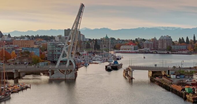 Aerial view of the waterfront and cityscape of Victoria with Johnson Bridge in British Columbia, Canada