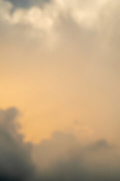 Soft hues of dusk enveloped in gentle clouds during twilight.