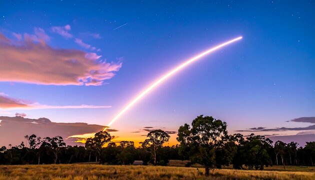 Rocket Launch Streaking Across Twilight Sky