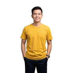 Fototapeta premium Happy young asian man wearing a yellow t-shirt isolated on white background