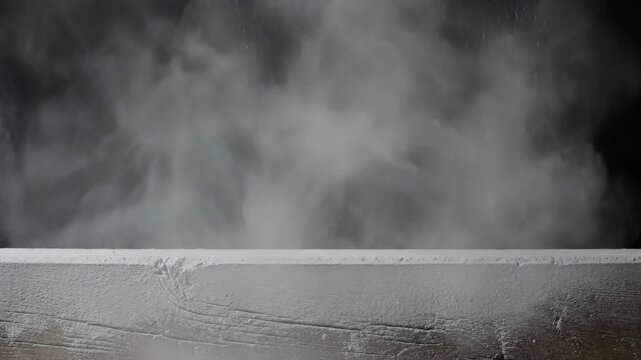 White powder hitting wooden surface creating cloud of dust. Impact of flour on plank surface in slow motion. Culinary explosion and cooking technique sequence
