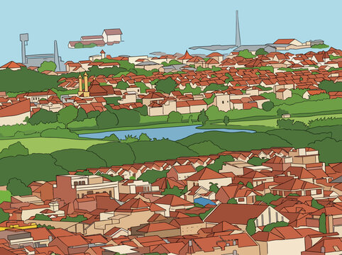 Aerial view of a suburban town with red-roofed houses, green trees, and a river running through it, set against a clear blue sky. Surabaya, East java, Indonesia.