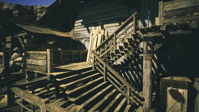 Sunlit weathered wooden staircase casting long shadows across carved railings, colonial balcony in namibia, saltweathered timber grain, warm lateafternoon