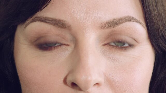 Face, mascara and blink with eye of woman for makeup, cosmetics and self care closeup. Cosmetology, microblading and eyelash extensions with person for vision, beauty aesthetic and salon treatment