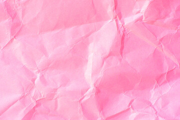 Fototapeta premium Pink crumpled paper texture background 