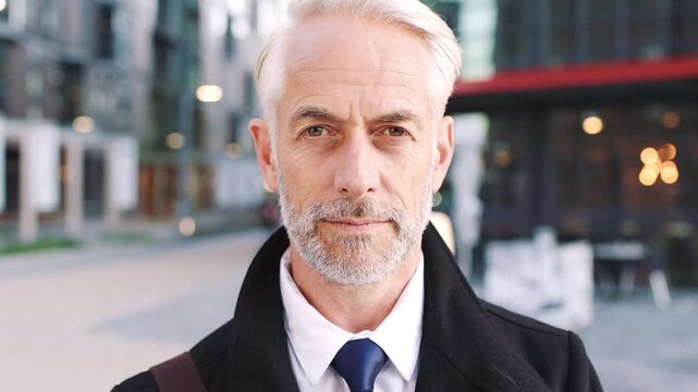 Business, face and mature man in city for property scouting, commercial investment and about us. Real estate, developer and confidence outdoor for building viewing, experience and urban development