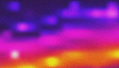Energetic blurred gradient with vibrant purple, magenta, orange, and yellow hues featuring abstract light effects