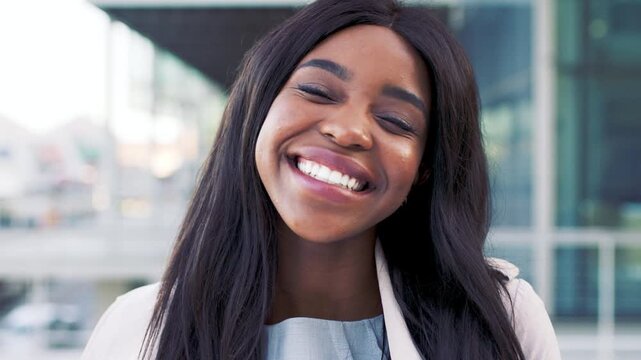 Laughing, face and career with business black woman in city for about us, property developer or pride. Real estate agent, happy and urban investor with person outdoor for confidence and professional