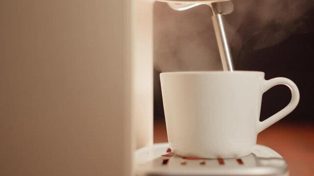 coffee maker spraying hot water, creating a white brew of coffee. The scene is in slow motion, with steam rising and catching the morning sunlight.