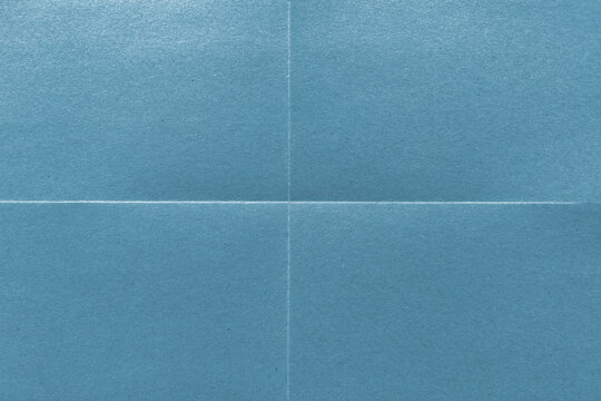 Textured blue paper background with copy space