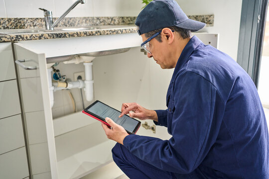 Plumber house and handyman with checklist, maintenance and service with expert. Employee contractor and repair with skills, inspection or quality control, home renovation or digital tablet