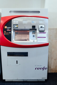 Barcelona, Spain-June 2, 2026. Train station ticket machine with renfe logo