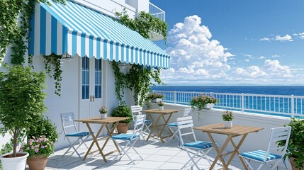 Fototapeta premium Charming coastal cafe terrace with striped awning, ocean view, and bright blue sky