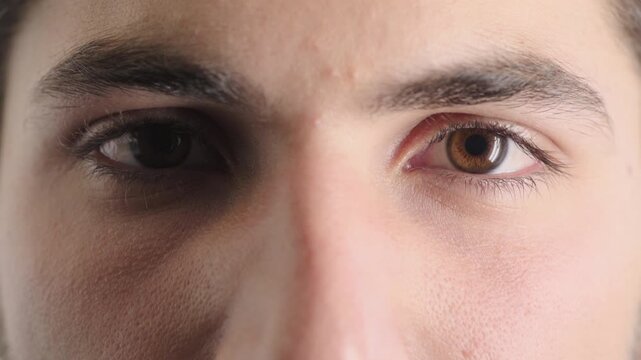 Face, eyes and man with pupil for optometry, perception and awareness for eyesight. Portrait, male person or retina closeup with peripheral vision, iris examination and optical care for visual health
