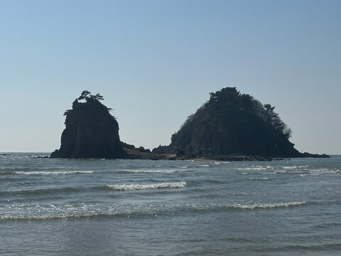 Sea stack rocks on the ocean shore