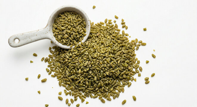 Pile of raw freekeh grains on white background