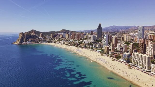 Highrise buildings and beach in Benidorm aerial view Spain.