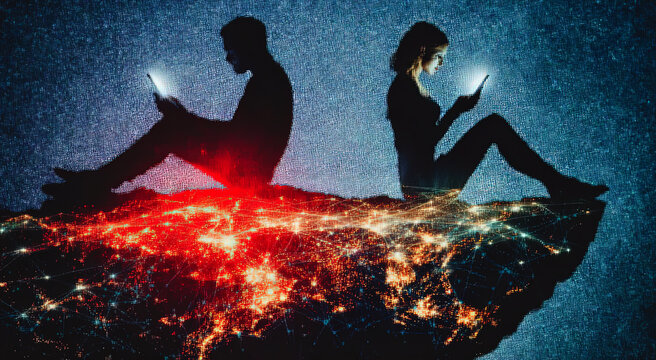 Global digital connectivity concept with human silhouettes using mobile devices atop an illuminated world map of city lights, illustrating hyper-connected society and telecommunications infrastructure