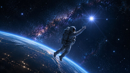 Fototapeta premium Astronaut floating above earth reaching toward star in space