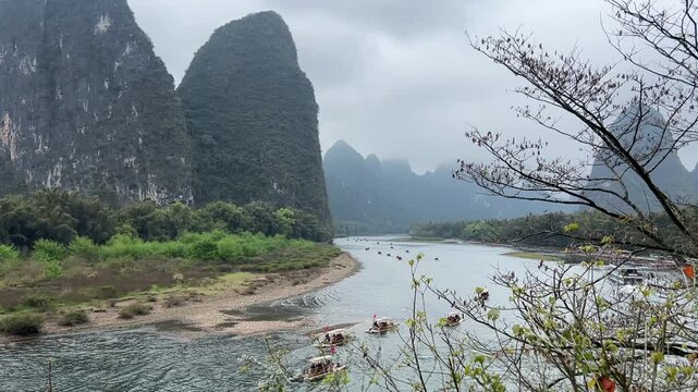 Iconic Li River Karst Mountain Scenery Yangshuo Guilin, Sightseeing Bamboo Raft Cruising on Calm River, Famous 20 RMB Landscape Guangxi China Overcast Nature View