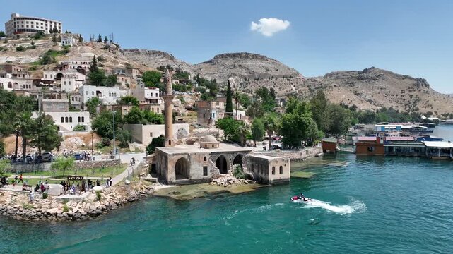 Drone Aerial View of Jet Ski Athlete Performing on the Halfeti River, May, 11, 2023, Sanliurfa, Halfeti, Turkiye