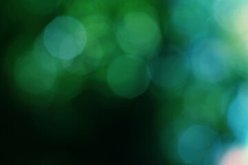 Abstract green and blue bokeh lights with soft blurred background nature scene © M Halim Abduh