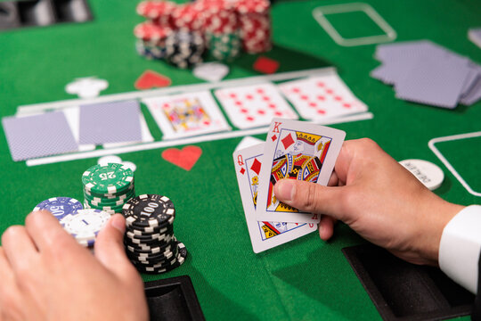 Two kings of playing cards on the poker table. A pair of kings is a strong combination in the poker game