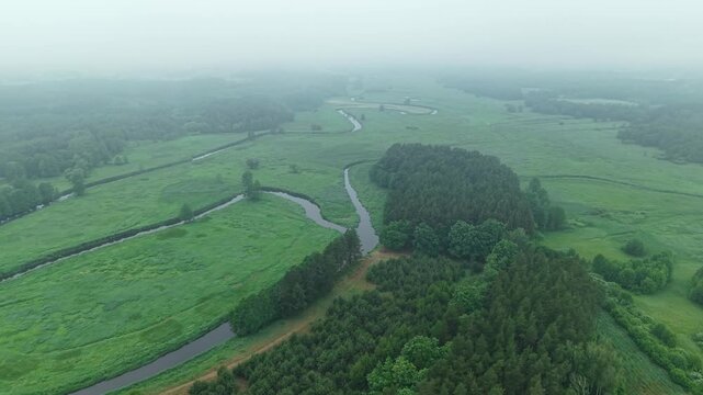 River Confluence &ndash; High Parallax Right Aerial Establishing in Cloud Layer