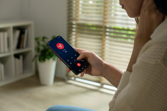 Woman calling emergency number 112 for crisis situation