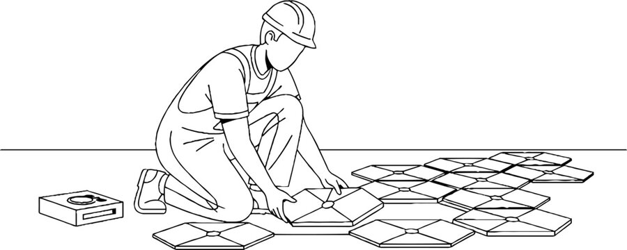 Construction worker installing floor tiles carefully by hand.