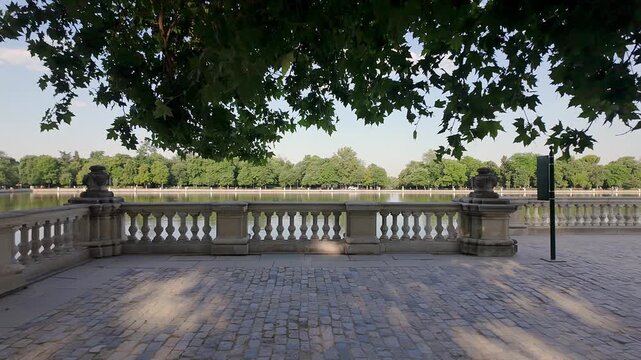 Views of the Retiro Park pond from the park's historical monuments, Madrid.