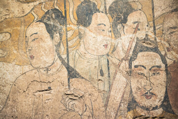 Fototapeta premium Taiyuan, China - May 8 2026: Vivid 6th-century tomb murals at the Taiyuan Beiqi Mural Museum depict the luxurious aristocratic lifestyle, grand processions, and rich cultural fusion of China's Norther