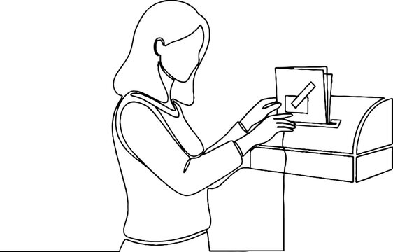 Woman using electronic voting machine indoors carefully.