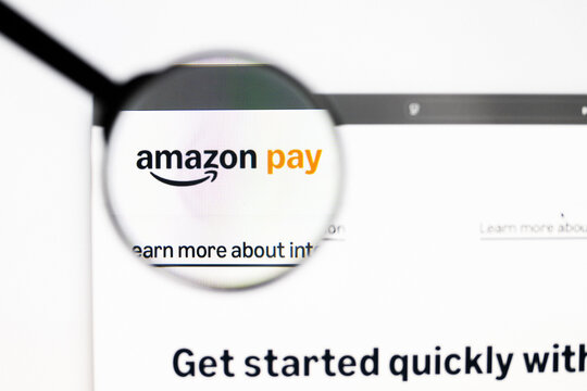 Milan, Italy 2026, 20 Apr Closeup of Amazon Pay website on a laptop screen. Amazon Pay logo under a magnifying glass.