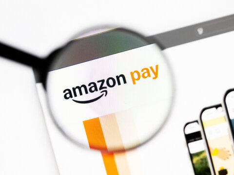 Milan, Italy 2026, 20 Apr Closeup of Amazon Pay website on a laptop screen. Amazon Pay logo under a magnifying glass.