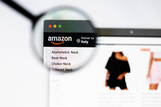 Milan, Italy 2026, 20 Apr Closeup of Amazon website on a laptop screen. Amazon logo under a magnifying glass.